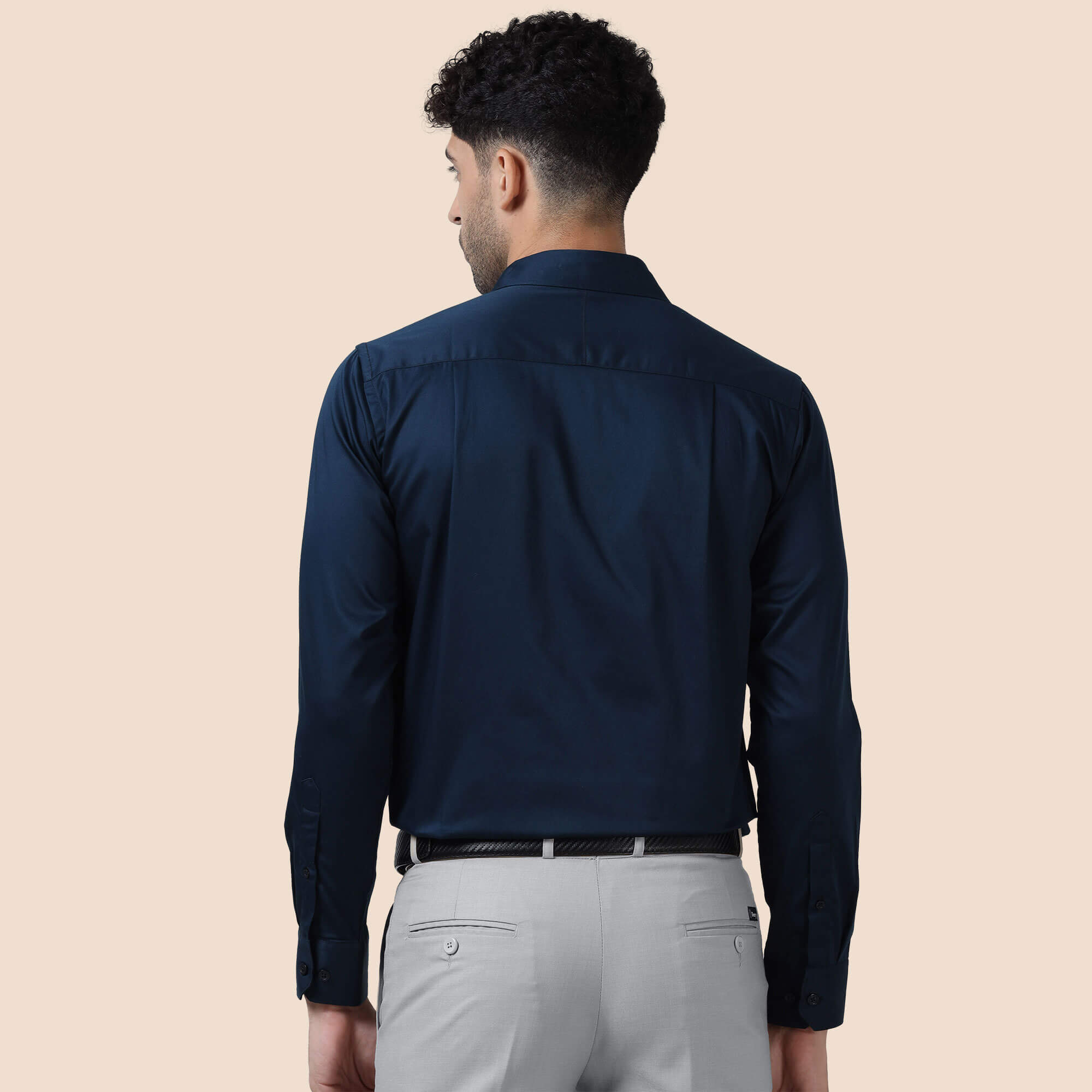 Navy shirt paired with formal trousers by TFC